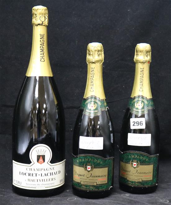 Two bottles of Doquet-Jeanmaire Champagne and one magnum of Locret-Lachaud Champagne.